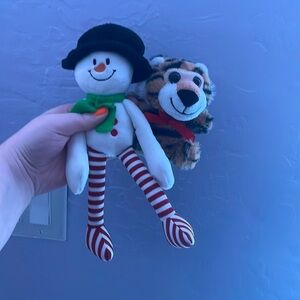 Tiger and snowman plushies